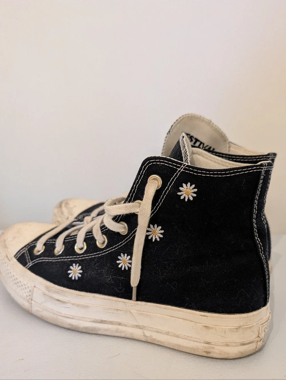 Converse Black Canvas High-Top Sneakers with White Daisies